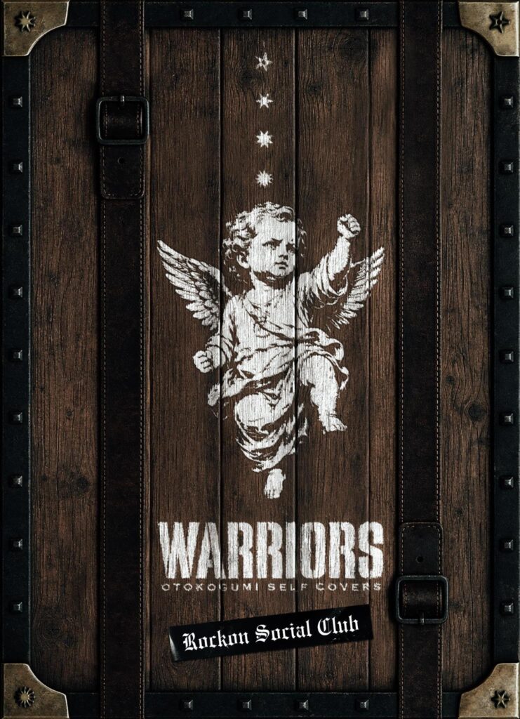Wooden door with metal straps and brass corners; a white cherub graphic above the words'WARRIORS' and a 'Rockin Social Club' label nearby.